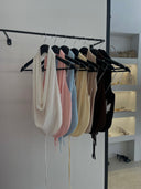 Oval Backless Top